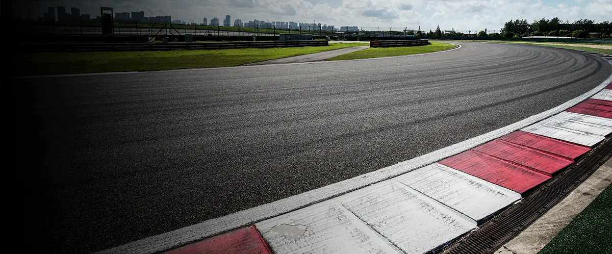 High-performance race car on track, illustrating motorsport insurance cover.